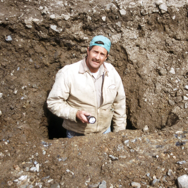 Excavated ground at a placer-mining site